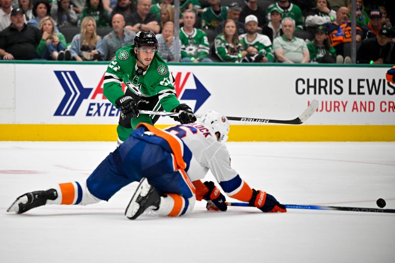 Oct 12, 2024; Dallas, Texas, USA; New York Islanders defenseman Ryan Pulock (6) blocks a pass by Dallas Stars left wing Mason Marchment (27) during the second period at the American Airlines Center. Mandatory Credit: Jerome Miron-Imagn Images