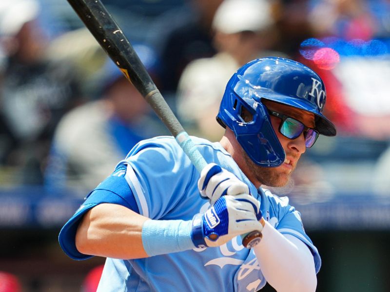 Jun 18, 2023; Kansas City, Missouri, USA; Kansas City Royals first baseman Matt Beaty (27) hits a single during the eighth inning against the Los Angeles Angels at Kauffman Stadium. Mandatory Credit: Jay Biggerstaff-USA TODAY Sports