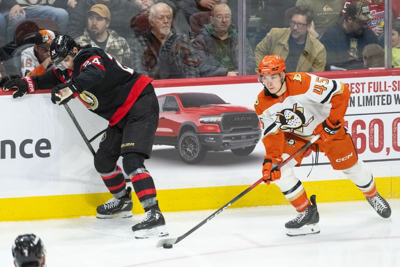 Mar 14, 2026; Ottawa, Ontario, CAN; Anaheim Ducks right wing Backett Sennecke (45) controls the puck as he skates past Ottawa Senators center Dylan Cozens (24) in the third period at the Canadian Tire Centre. Mandatory Credit: Marc DesRosiers-IMAGN Images Mar 14, 2026; Ottawa, Ontario, CAN; Anaheim Ducks right wing Backett Sennecke (45) controls the puck as he skates past Ottawa Senators center Dylan Cozens (24) in the third period at the Canadian Tire Centre. Mandatory Credit: Marc DesRosiers-IMAGN Images