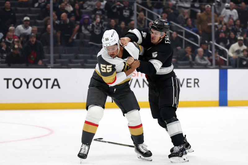 Oct 30, 2024; Los Angeles, California, USA;  Vegas Golden Knights right wing Keegan Kolesar (55) and Los Angeles Kings defenseman Andreas Englund (5) fight on the ice during the first period at Crypto.com Arena. Mandatory Credit: Kiyoshi Mio-Imagn Images