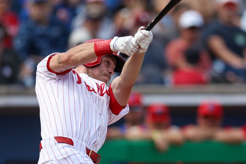 Mar 4, 2025; Clearwater, Florida, USA; Philadelphia Phillies outfielder Max Kepler (17) hits a home run against the New York Yankees in the second inning during spring training at BayCare Ballpark. Mandatory Credit: Nathan Ray Seebeck-Imagn Images