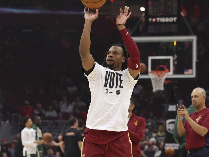 CLEVELAND, OH - NOVEMBER 4:  Darius Garland #10 of the Cleveland Cavaliers warms up before the game against the Milwaukee Bucks on November 4, 2024 at Rocket Mortgage FieldHouse in Cleveland, Ohio. NOTE TO USER: User expressly acknowledges and agrees that, by downloading and/or using this Photograph, user is consenting to the terms and conditions of the Getty Images License Agreement. Mandatory Copyright Notice: Copyright 2024 NBAE (Photo by  Lauren Leigh Bacho/NBAE via Getty Images)