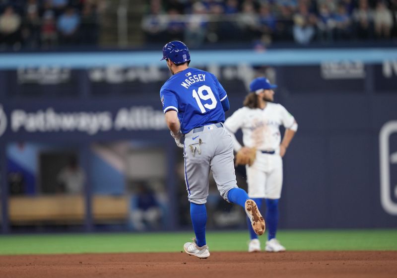 May 1, 2024; Toronto, Ontario, CAN; Kansas City Royals second baseman Michael Massey (19) rounds the bases after hitting a three run home run against the Toronto Blue Jays during the eighth inning at Rogers Centre. Mandatory Credit: Nick Turchiaro-USA TODAY Sports