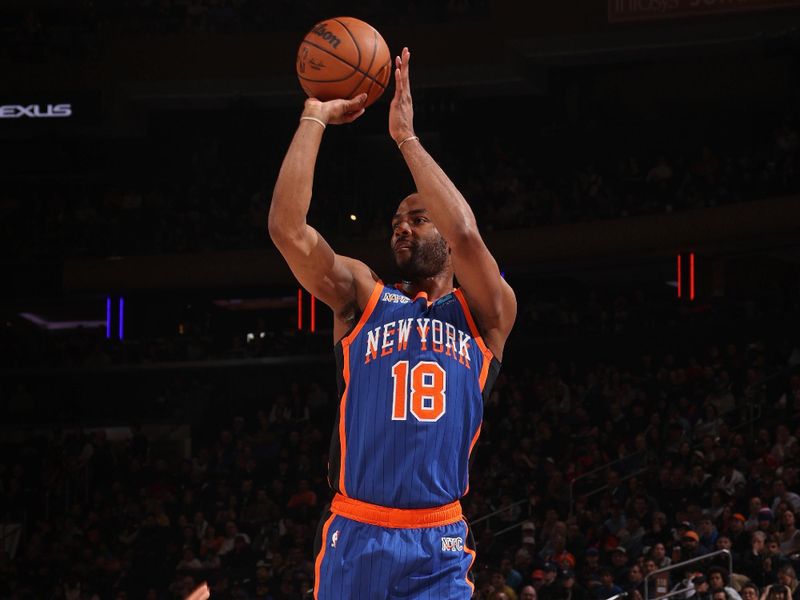 NEW YORK, NY - MARCH 23: Alec Burks #18 of the New York Knicks three point basket during the game against the Brooklyn Nets on March 23, 2024 at Madison Square Garden in New York City, New York.  NOTE TO USER: User expressly acknowledges and agrees that, by downloading and or using this photograph, User is consenting to the terms and conditions of the Getty Images License Agreement. Mandatory Copyright Notice: Copyright 2024 NBAE  (Photo by Nathaniel S. Butler/NBAE via Getty Images)