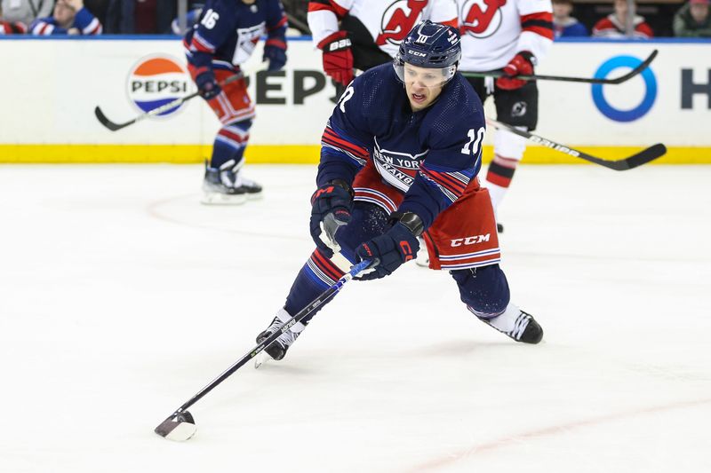 Apr 3, 2024; New York, New York, USA; New York Rangers left wing Artemi Panarin (10) chases the puck in the third period against the New Jersey Devils at Madison Square Garden. Mandatory Credit: Wendell Cruz-USA TODAY Sports