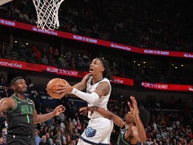 NEW ORLEANS, LA - DECEMBER 19: Ja Morant #12 of the Memphis Grizzlies drives to the basket during the game against the New Orleans Pelicans on December 19, 2023 at the Smoothie King Center in New Orleans, Louisiana. NOTE TO USER: User expressly acknowledges and agrees that, by downloading and or using this Photograph, user is consenting to the terms and conditions of the Getty Images License Agreement. Mandatory Copyright Notice: Copyright 2023 NBAE (Photo by Jonathan Bachman/NBAE via Getty Images)