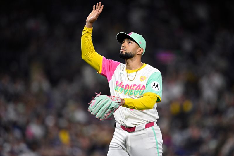 May 10, 2024; San Diego, California, USA; San Diego Padres relief pitcher Robert Suarez (75) celebrates after pitching the top of the ninth inning against the Los Angeles Dodgers at Petco Park. Mandatory Credit: Orlando Ramirez-USA TODAY Sports