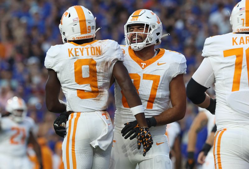 Sep 16, 2023; Gainesville, Florida, USA; Tennessee Volunteers wide receiver Ramel Keyton (9) is congratulated by tight end Jacob Warren (87) after he scored a touchdown against the Florida Gators during the first quarter at Ben Hill Griffin Stadium. Mandatory Credit: Kim Klement Neitzel-USA TODAY Sports