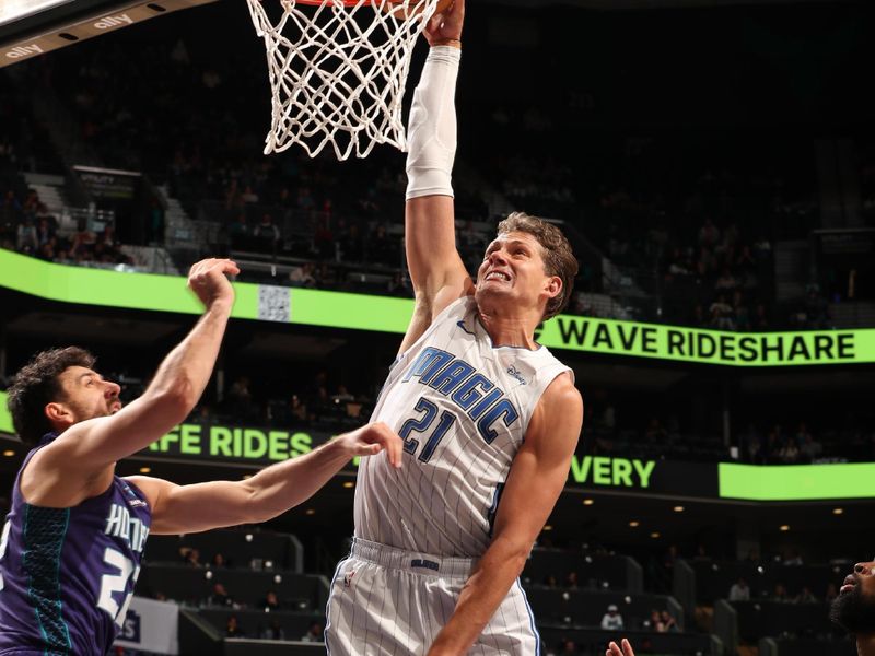 CHARLOTTE, NC - MARCH 5: Moritz Wagner #21 of the Orlando Magic dunks the ball during the game against the Charlotte Hornets on March 5, 2024 at Spectrum Center in Charlotte, North Carolina. NOTE TO USER: User expressly acknowledges and agrees that, by downloading and or using this photograph, User is consenting to the terms and conditions of the Getty Images License Agreement. Mandatory Copyright Notice: Copyright 2024 NBAE (Photo by Kent Smith/NBAE via Getty Images)