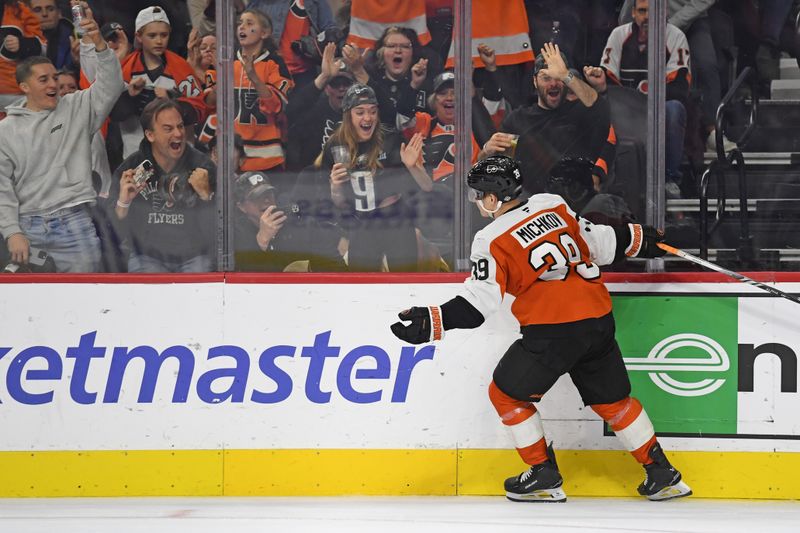 Nov 11, 2024; Philadelphia, Pennsylvania, USA; Philadelphia Flyers right wing Matvei Michkov (39) celebrates his goal against the San Jose Sharks during the shootout period at Wells Fargo Center. Mandatory Credit: Eric Hartline-Imagn Images