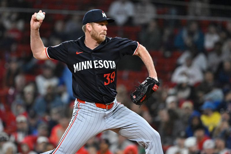 Sep 22, 2024; Boston, MA, USA;  Minnesota Twins pitcher Michael Tonkin (39) pitches against the Boston Red Sox during the sixth inning at Fenway Park. Mandatory Credit: Eric Canha-Imagn Images