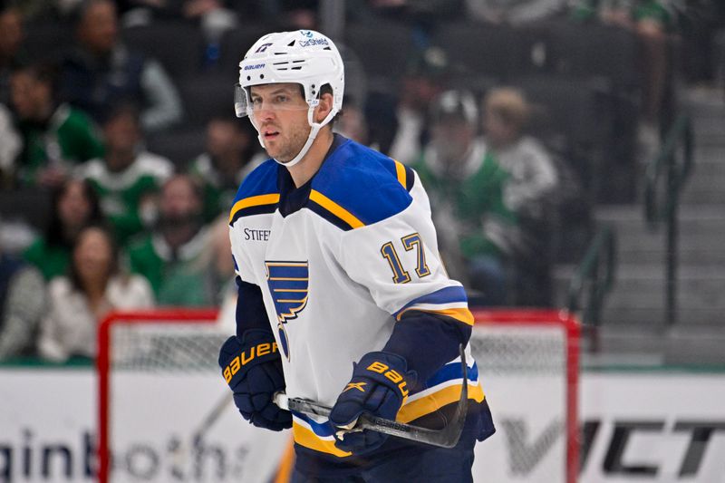 Dec 14, 2024; Dallas, Texas, USA; St. Louis Blues defenseman Cam Fowler (17) skates against the Dallas Stars during the first period at American Airlines Center. Mandatory Credit: Jerome Miron-Imagn Images