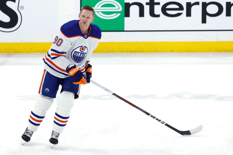 Mar 26, 2024; Winnipeg, Manitoba, CAN; Edmonton Oilers right wing Corey Perry (90) warms up before a game against the Winnipeg Jets at Canada Life Centre. Mandatory Credit: James Carey Lauder-USA TODAY Sports