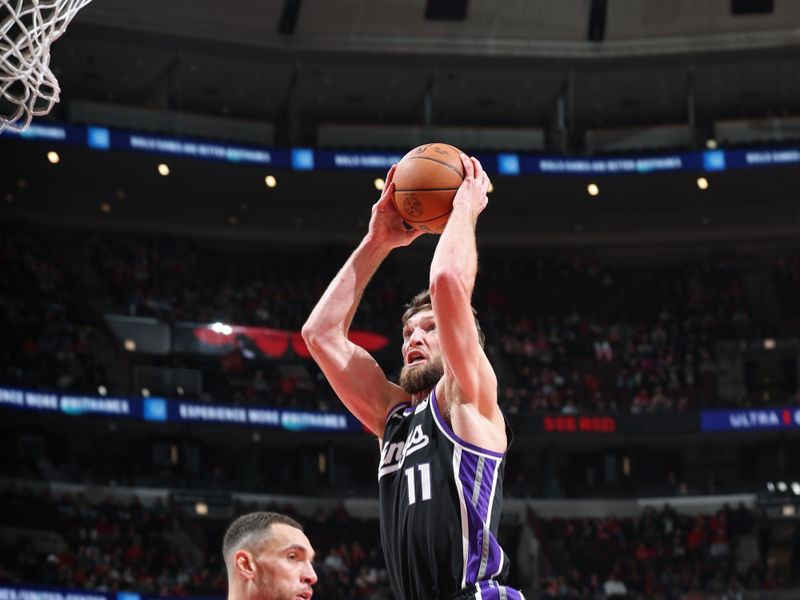 CHICAGO, IL - JANUARY 12: Domantas Sabonis #11 of the Sacramento Kings drives to the basket during the game against the Chicago Bulls on January 12, 2025 at United Center in Chicago, Illinois. NOTE TO USER: User expressly acknowledges and agrees that, by downloading and or using this photograph, User is consenting to the terms and conditions of the Getty Images License Agreement. Mandatory Copyright Notice: Copyright 2025 NBAE (Photo by Jeff Haynes/NBAE via Getty Images)