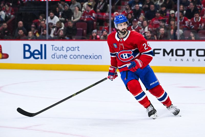 Jan 10, 2026; Montreal, Quebec, CAN; Montreal Canadiens center Phillip Danault (24) looks on against the Detroit Red Wings during the third period at Bell Centre. Mandatory Credit: David Kirouac-Imagn Images
