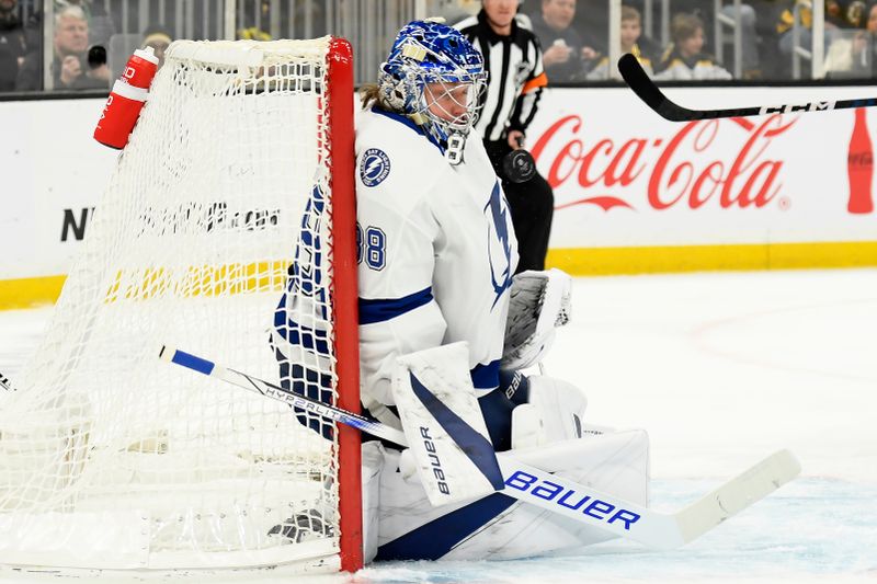 Feb 13, 2024; Boston, Massachusetts, USA;  Tampa Bay Lightning goaltender Andrei Vasilevskiy (88) makes a save during the first period against the Boston Bruins at TD Garden. Mandatory Credit: Bob DeChiara-USA TODAY Sports