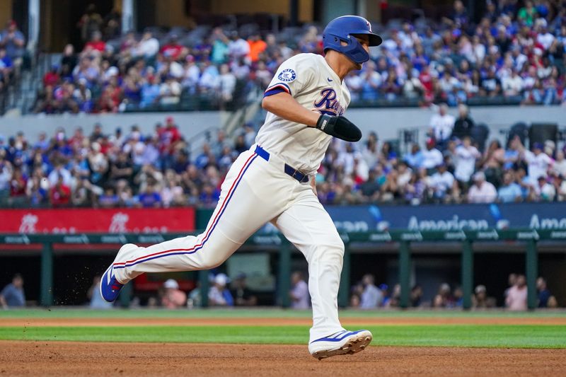 May 3, 2025; Arlington, Texas, USA; Texas Rangers designated hitter Cory Seager rounds the bases to score during the fourth inning against the Seattle Mariners at Globe Life Field. Mandatory Credit: Raymond Carlin III-Imagn Images