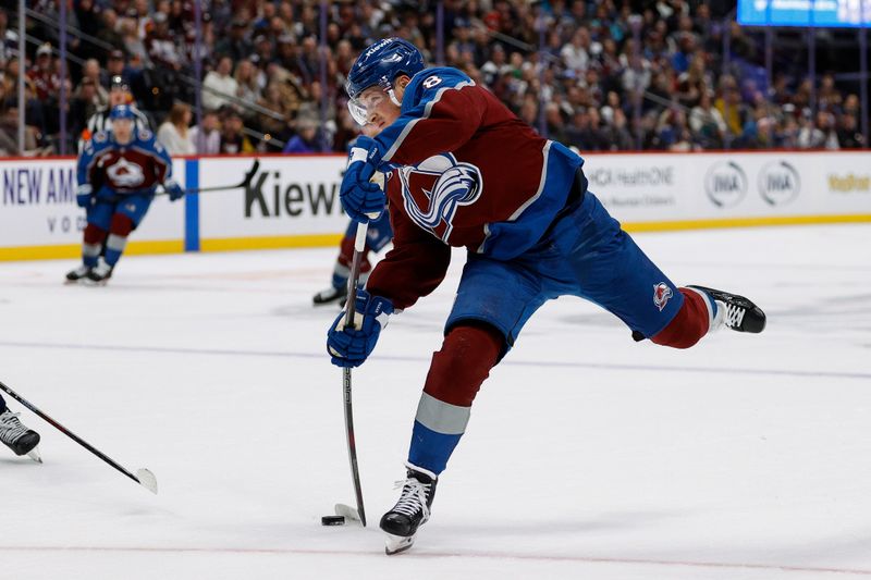 Nov 15, 2024; Denver, Colorado, USA; Colorado Avalanche defenseman Cale Makar (8) attempts a shot in the second period against the Washington Capitals at Ball Arena. Mandatory Credit: Isaiah J. Downing-Imagn Images