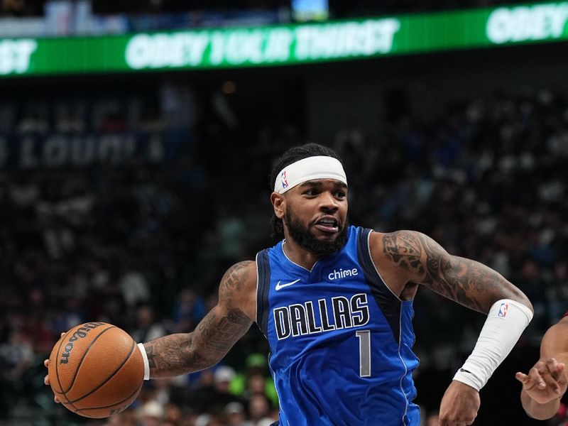 DALLAS, TX - JANUARY 03:  Jaden Hardy #1 of the Dallas Mavericks dribbles the ball during the game against the Cleveland Cavaliers on January 3, 2025 at American Airlines Center in Dallas, Texas. NOTE TO USER: User expressly acknowledges and agrees that, by downloading and or using this photograph, User is consenting to the terms and conditions of the Getty Images License Agreement. Mandatory Copyright Notice: Copyright 2025 NBAE (Photo by Glenn James/NBAE via Getty Images)