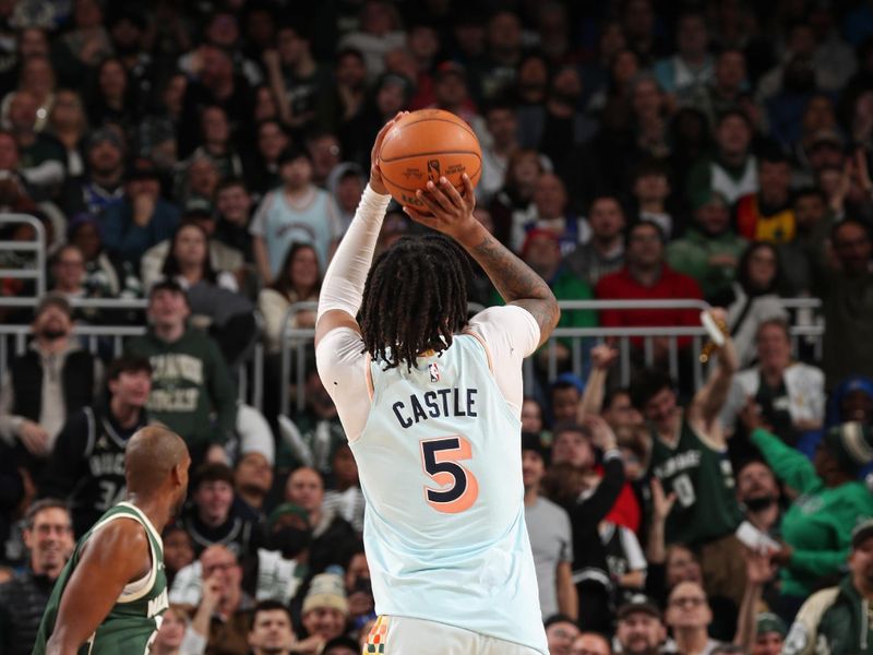 MILWAUKEE, WI - JANUARY 8: Stephon Castle #5 of the San Antonio Spurs three point basket during the game against the Milwaukee Bucks on January 8, 2025 at the Fiserv Forum Center in Milwaukee, Wisconsin. NOTE TO USER: User expressly acknowledges and agrees that, by downloading and or using this Photograph, user is consenting to the terms and conditions of the Getty Images License Agreement. Mandatory Copyright Notice: Copyright 2025 NBAE (Photo by Gary Dineen/NBAE via Getty Images).