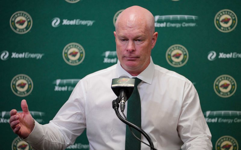 Nov 28, 2023; Saint Paul, Minnesota, USA;  Minnesota Wild head coach John Hynes talks to the media after a game against the St. Louis Blues at Xcel Energy Center. Mandatory Credit: Brad Rempel-USA TODAY Sports