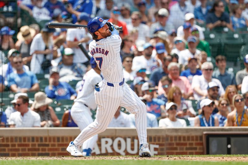 Jun 19, 2024; Chicago, Illinois, USA; Chicago Cubs shortstop Dansby Swanson (7) hits a solo home run against the Chicago Cubs during the fourth inning at Wrigley Field. Mandatory Credit: Kamil Krzaczynski-USA TODAY Sports