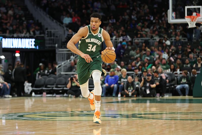 MILWAUKEE, WISCONSIN - FEBRUARY 09: Giannis Antetokounmpo #34 of the Milwaukee Bucks handles the ball during a game against the Charlotte Hornets at Fiserv Forum on February 09, 2024 in Milwaukee, Wisconsin. NOTE TO USER: User expressly acknowledges and agrees that, by downloading and or using this photograph, User is consenting to the terms and conditions of the Getty Images License Agreement. (Photo by Stacy Revere/Getty Images)