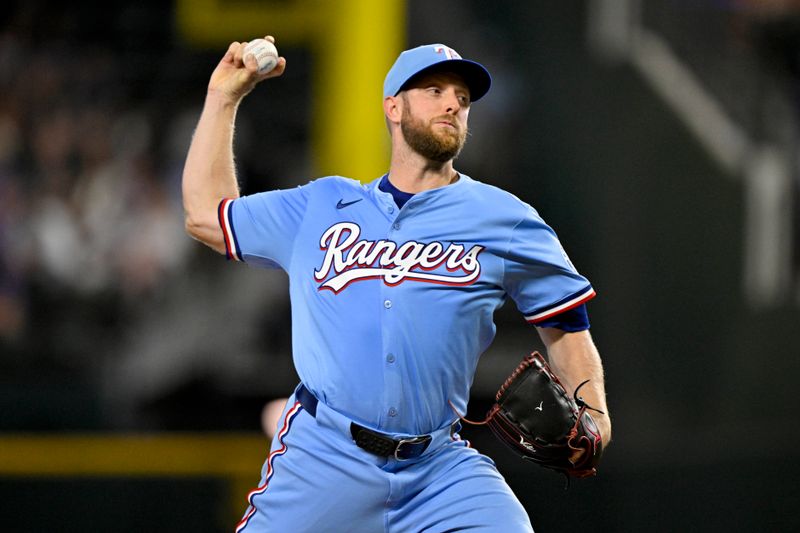 Aug 24, 2025; Arlington, Texas, USA; Texas Rangers starting pitcher Merrill Kelly (23) pitches against the Cleveland Guardians during the third inning at Globe Life Field. Mandatory Credit: Jerome Miron-Imagn Images