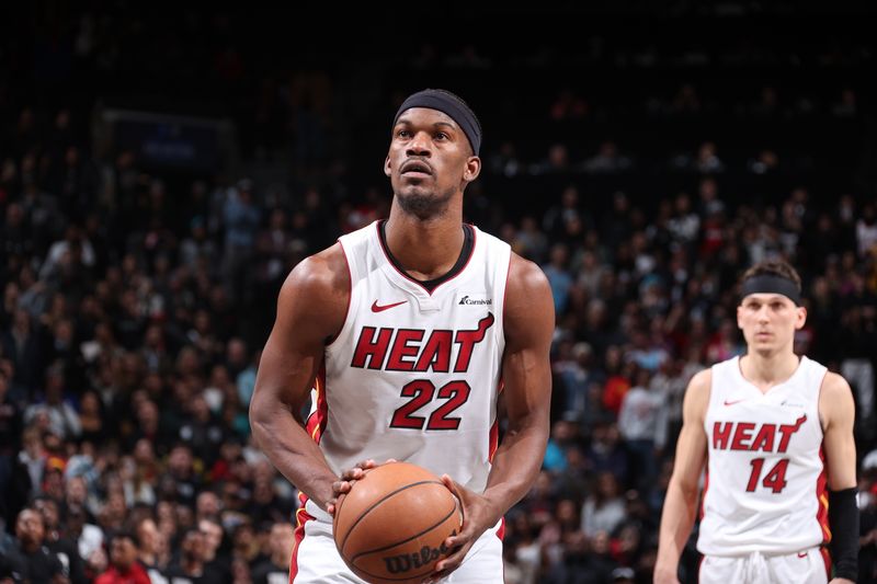 BROOKLYN, NY - JANUARY 15: Jimmy Butler #22 of the Miami Heat makes the game winning free throw during the game against the Brooklyn Nets on January 15, 2024 at Barclays Center in Brooklyn, New York. NOTE TO USER: User expressly acknowledges and agrees that, by downloading and or using this Photograph, user is consenting to the terms and conditions of the Getty Images License Agreement. Mandatory Copyright Notice: Copyright 2024 NBAE (Photo by Nathaniel S. Butler/NBAE via Getty Images)