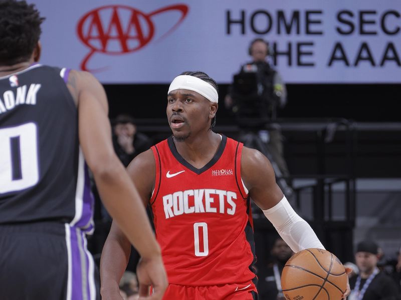 SACRAMENTO, CA - JANUARY 16: Aaron Holiday #0 of the Houston Rockets dribbles the ball during the game against the Sacramento Kings on January 16, 2025 at Golden 1 Center in Sacramento, California. NOTE TO USER: User expressly acknowledges and agrees that, by downloading and or using this Photograph, user is consenting to the terms and conditions of the Getty Images License Agreement. Mandatory Copyright Notice: Copyright 2025 NBAE (Photo by Rocky Widner/NBAE via Getty Images)