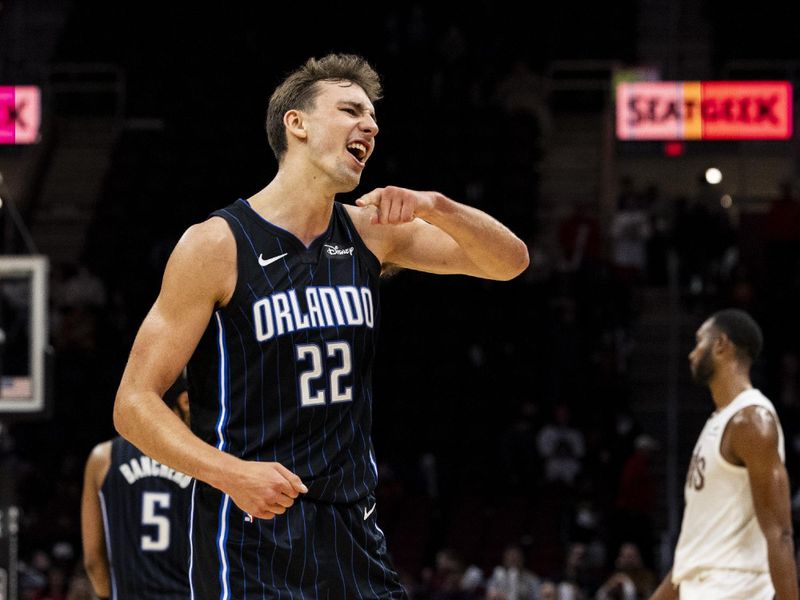 CLEVELAND, OHIO - FEBRUARY 22: Franz Wagner #22 of the Orlando Magic celebrates during the game against the against the Cleveland Cavaliers at Rocket Mortgage Fieldhouse on February 22, 2024 in Cleveland, Ohio. The Magic beat the Cavaliers 116-109.<p><br/></p>NOTE TO USER: User expressly acknowledges and agrees that, by downloading and or using this photograph, User is consenting to the terms and conditions of the Getty Images License Agreement. (Photo by Lauren Leigh Bacho/Getty Images)