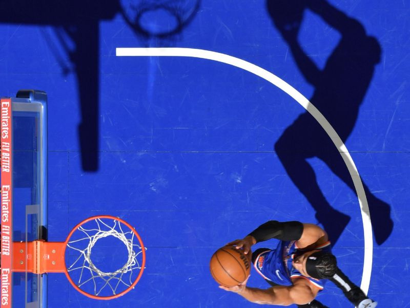 PHILADELPHIA, PA - JANUARY 15: Josh Hart #3 of the New York Knicks drives to the basket during the game against the Philadelphia 76ers on January 15, 2025 at the Wells Fargo Center in Philadelphia, Pennsylvania NOTE TO USER: User expressly acknowledges and agrees that, by downloading and/or using this Photograph, user is consenting to the terms and conditions of the Getty Images License Agreement. Mandatory Copyright Notice: Copyright 2025 NBAE (Photo by Jesse D. Garrabrant/NBAE via Getty Images)