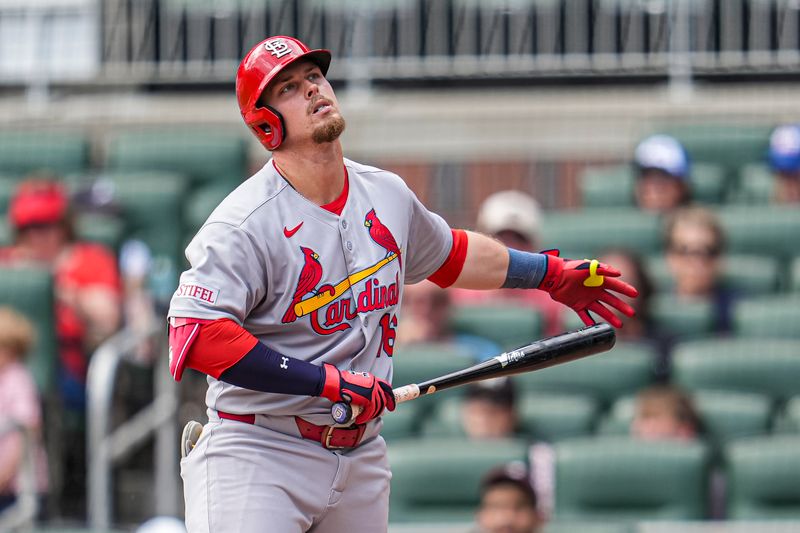 Apr 23, 2025; Cumberland, Georgia, USA; St. Louis Cardinals second base Nolan Gorman (16) reacts after striking out against the Atlanta Braves during the eighth inning at Truist Park. Mandatory Credit: Dale Zanine-Imagn Images