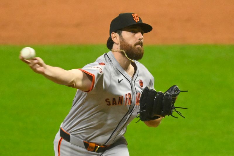 Jul 5, 2024; Cleveland, Ohio, USA; San Francisco Giants relief pitcher Ryan Walker (74) delivers a pitch in the the sixth inning against the Cleveland Guardians at Progressive Field. Mandatory Credit: David Richard-USA TODAY Sports