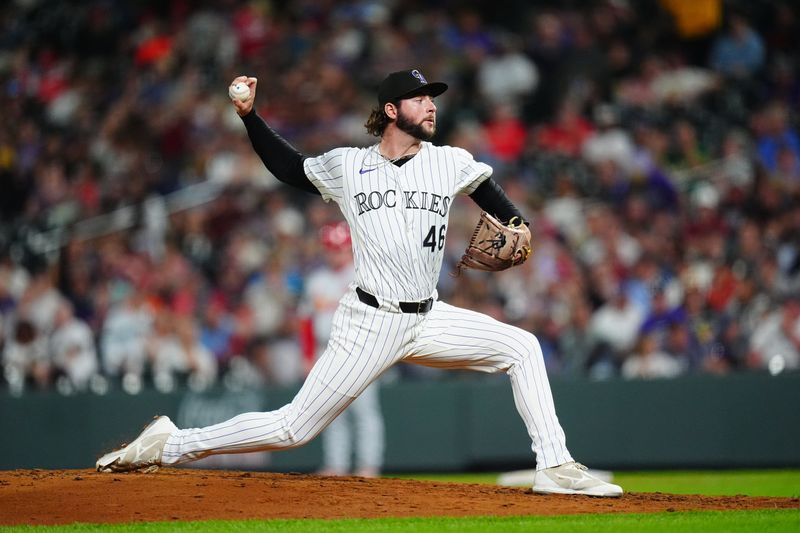 Sep 25, 2024; Denver, Colorado, USA; Colorado Rockies relief pitcher Jeff Criswell (46) delivers a pitch in the sixth inning against the St. Louis Cardinals at Coors Field. Mandatory Credit: Ron Chenoy-Imagn Images
