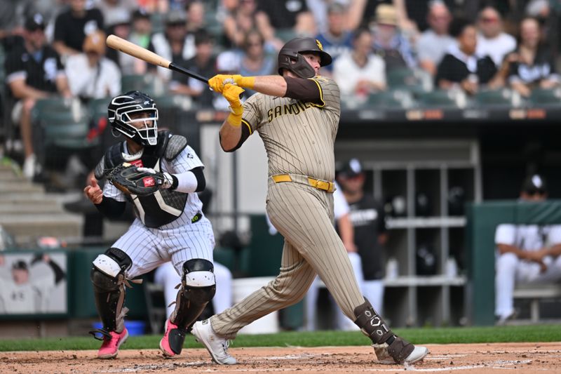Sep 21, 2025; Chicago, Illinois, USA; San Diego Padres designated hitter Gavin Sheets (30) hits a single against the Chicago White Sox during the second inning at Rate Field. Mandatory Credit: Patrick Gorski-Imagn Images