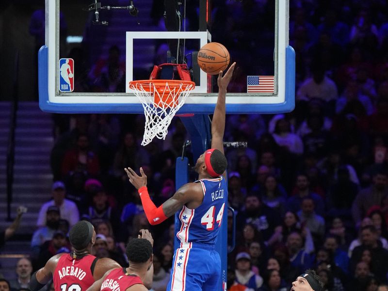 PHILADELPHIA, PA - FEBRUARY 14: Paul Reed #44 of the Philadelphia 76ers drives to the basket during the game against the Miami Heat on February 14, 2024 at the Wells Fargo Center in Philadelphia, Pennsylvania NOTE TO USER: User expressly acknowledges and agrees that, by downloading and/or using this Photograph, user is consenting to the terms and conditions of the Getty Images License Agreement. Mandatory Copyright Notice: Copyright 2024 NBAE (Photo by Jesse D. Garrabrant/NBAE via Getty Images)