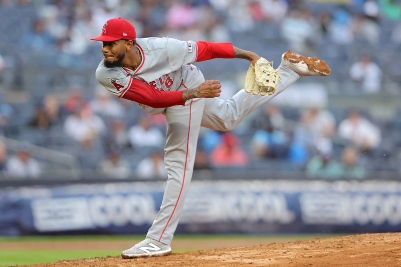 Aug 7, 2024; Bronx, New York, USA; Los Angeles Angels relief pitcher Jose Marte (68) follows through on a pitch against the New York Yankees during the fifth inning at Yankee Stadium. Mandatory Credit: Brad Penner-USA TODAY Sports