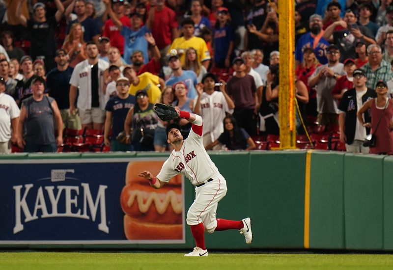 Jul 23, 2023; Boston, Massachusetts, USA; Boston Red Sox center fielder Adam Duvall (18) catches the fly ball for the final out of the game against the New York Mets in the ninth inning at Fenway Park. Mandatory Credit: David Butler II-USA TODAY Sports