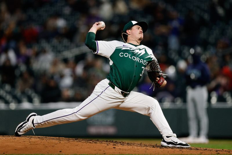 Apr 20, 2024; Denver, Colorado, USA; Colorado Rockies relief pitcher Victor Vodnik (38) pitches in the fifth inning against the Seattle Mariners at Coors Field. Mandatory Credit: Isaiah J. Downing-USA TODAY Sports