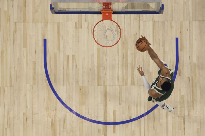 DETROIT, MI - JANUARY 22: Giannis Antetokounmpo #34 of the Milwaukee Bucks drives to the basket during the game against the Detroit Pistons  on January 22, 2024 at Little Caesars Arena in Detroit, Michigan. NOTE TO USER: User expressly acknowledges and agrees that, by downloading and/or using this photograph, User is consenting to the terms and conditions of the Getty Images License Agreement. Mandatory Copyright Notice: Copyright 2024 NBAE (Photo by Brian Sevald/NBAE via Getty Images)