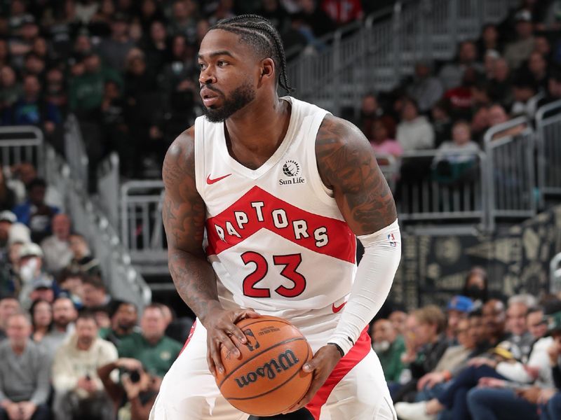 MILWAUKEE, WI - JANUARY 17: Jamal Shead #23 of the Toronto Raptors handles the ball during the game against the Milwaukee Bucks on January 17, 2025 at Fiserv Forum Center in Milwaukee, Wisconsin. NOTE TO USER: User expressly acknowledges and agrees that, by downloading and or using this Photograph, user is consenting to the terms and conditions of the Getty Images License Agreement. Mandatory Copyright Notice: Copyright 2025 NBAE (Photo by Gary Dineen/NBAE via Getty Images).