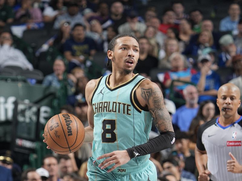 DALLAS, TX - FEBRUARY 27: Nick Smith Jr. #8 of the Charlotte Hornets brings the ball up court during the game against the Dallas Mavericks on February 27, 2025 at American Airlines Center in Dallas, Texas. NOTE TO USER: User expressly acknowledges and agrees that, by downloading and or using this photograph, User is consenting to the terms and conditions of the Getty Images License Agreement. Mandatory Copyright Notice: Copyright 2025 NBAE(Photo by Glenn James/NBAE via Getty Images)