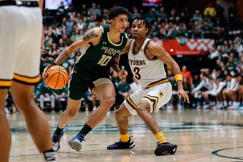 Mar 2, 2024; Fort Collins, Colorado, USA; Colorado State Rams guard Nique Clifford (10) drives to the basket against Wyoming Cowboys guard Sam Griffin (3) in the first half at Moby Arena. Mandatory Credit: Isaiah J. Downing-USA TODAY Sports