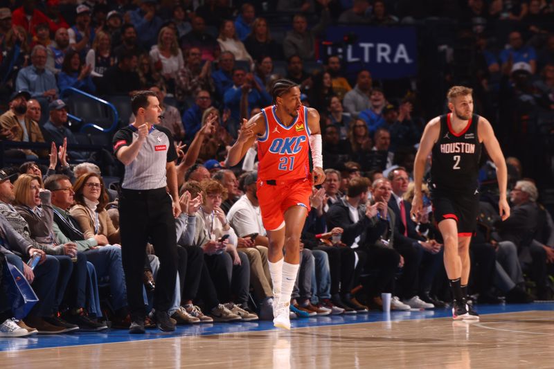 OKLAHOMA CITY, OK - MARCH 27:  Aaron Wiggins #21 of the Oklahoma City Thunder reacts during the game against the Houston Rockets on March 27, 2024 at Paycom Arena in Oklahoma City, Oklahoma. NOTE TO USER: User expressly acknowledges and agrees that, by downloading and or using this photograph, User is consenting to the terms and conditions of the Getty Images License Agreement. Mandatory Copyright Notice: Copyright 2024 NBAE (Photo by Zach Beeker/NBAE via Getty Images)