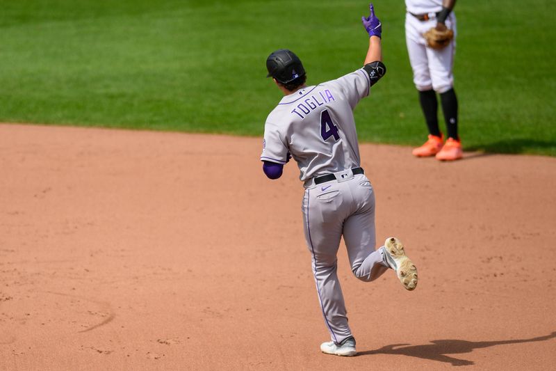 Aug 27, 2023; Baltimore, Maryland, USA; Colorado Rockies first baseman Michael Toglia (4) rounds the bases after hitting a home run during the fifth inning against the Baltimore Orioles at Oriole Park at Camden Yards. Mandatory Credit: Reggie Hildred-USA TODAY Sports