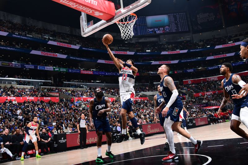 LOS ANGELES, CA - MARCH 1: Jordan Poole #13 of the Washington Wizards drives to the basket during the game against the LA Clippers on March 1, 2024 at Crypto.Com Arena in Los Angeles, California. NOTE TO USER: User expressly acknowledges and agrees that, by downloading and/or using this Photograph, user is consenting to the terms and conditions of the Getty Images License Agreement. Mandatory Copyright Notice: Copyright 2024 NBAE (Photo by Adam Pantozzi/NBAE via Getty Images)