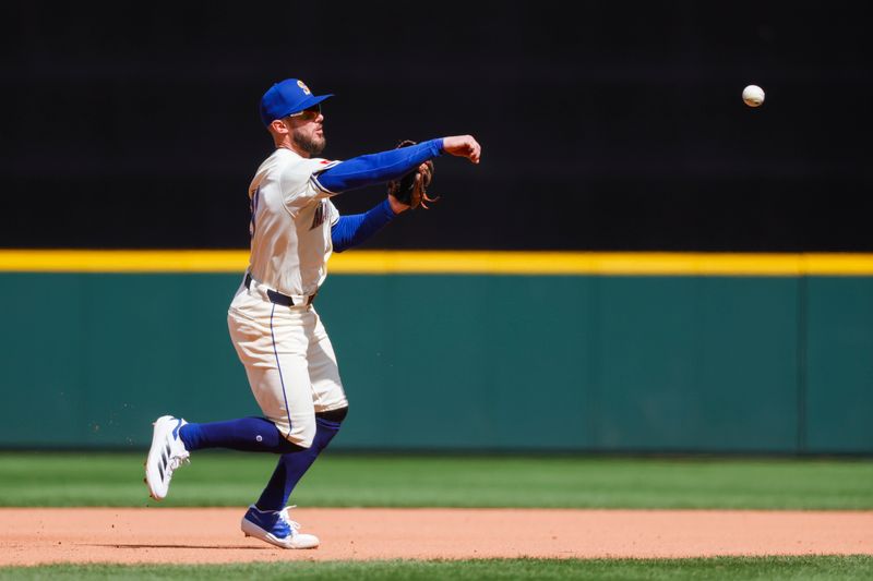 Apr 13, 2025; Seattle, Washington, USA; Seattle Mariners third baseman Miles Mastrobuoni (21) throws to first base for an out against the Texas Rangers during the fifth inning at T-Mobile Park. Mandatory Credit: Joe Nicholson-Imagn Images