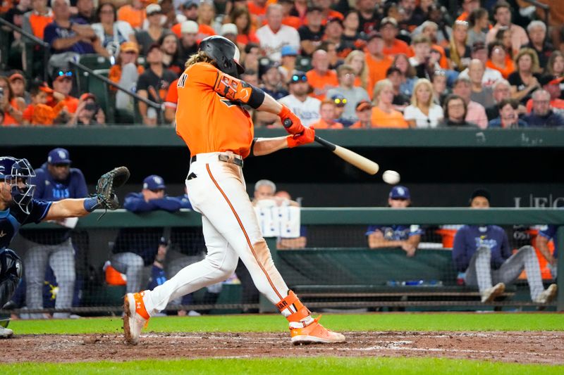 Sep 16, 2023; Baltimore, Maryland, USA; Baltimore Orioles shortstop Gunnar Henderson (2) hits an RBI single against the Tampa Bay Rays during the fourth inning at Oriole Park at Camden Yards. Mandatory Credit: Gregory Fisher-USA TODAY Sports