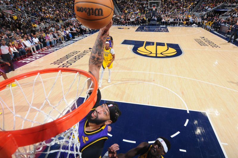 INDIANAPOLIS, IN - MARCH 29:  Anthony Davis #3 of the Los Angeles Lakers drives to the basket during the game against the Indiana Pacers on March 29, 2024 at Gainbridge Fieldhouse in Indianapolis, Indiana. NOTE TO USER: User expressly acknowledges and agrees that, by downloading and or using this Photograph, user is consenting to the terms and conditions of the Getty Images License Agreement. Mandatory Copyright Notice: Copyright 2024 NBAE (Photo by Ron Hoskins/NBAE via Getty Images)